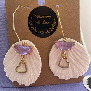 White petals with lavender charm and gold heart hoop earrings (dangles)